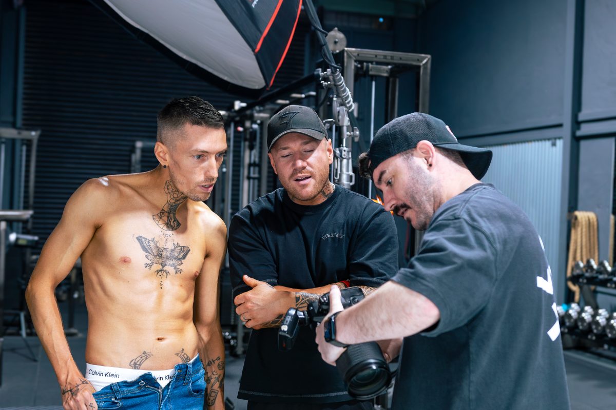 Client and crew reviewing shots on the camera together mid-shoot