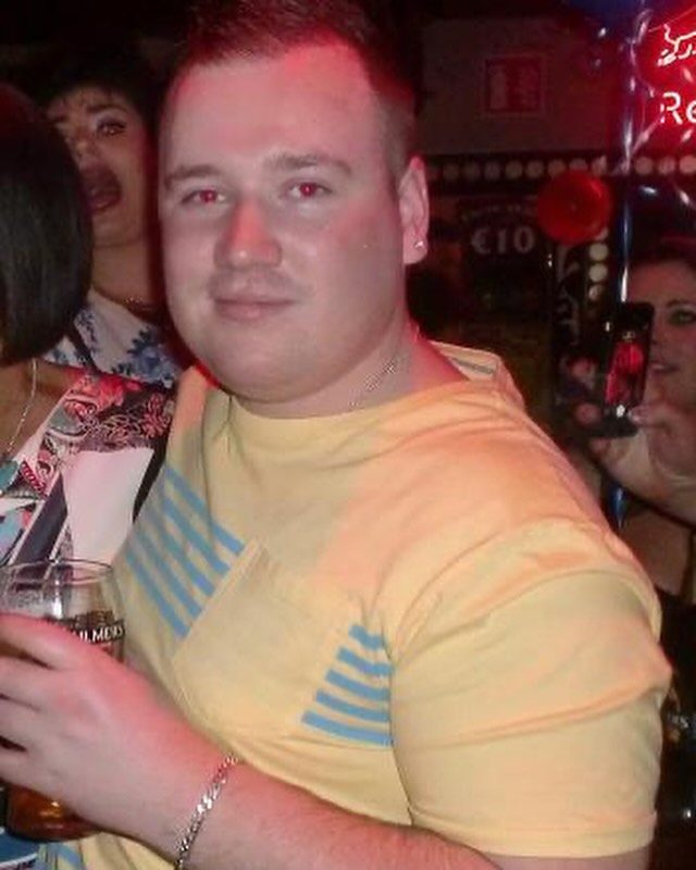 Paul before his transformation, holding a pint on a night out
